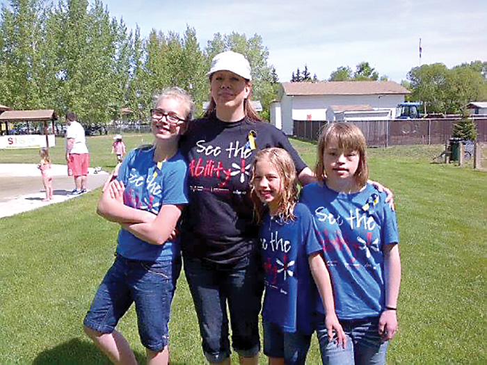 From left are, Dharma, Tracy, Abby and Carmelle Boutin at their first Down Syndrome Walk in 2013 in White City, Saskatchewan. 